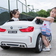BMW X6 M XXL elektromos 2 személyes kisautó gyerekeknek bőrüléssel, gumi kerékkel, távirányítóval, fekete színben